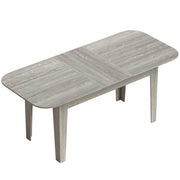 Extendable dining table with rounded edges, studio shot