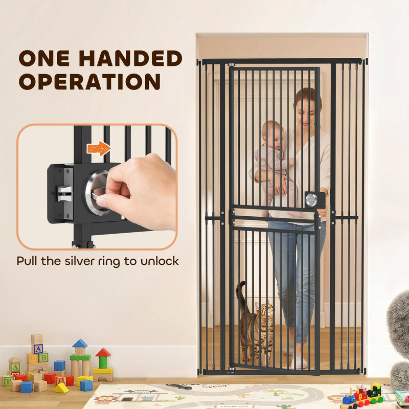 One-handed pull-ring latch being unlocked, with a parent holding a baby behind the gate