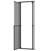 Black pet gate with its walk-through door swung open on a white background