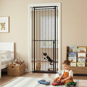 Black pet gate in a child's bedroom doorway with a cat and a toddler playing