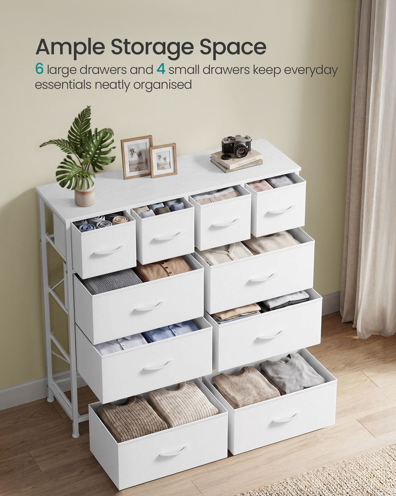 White 10 drawer chest with every drawer open and filled with folded clothes