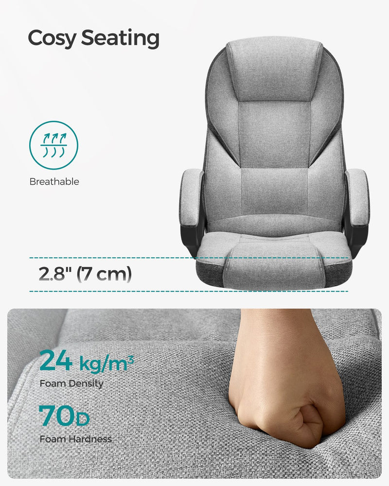 Hand pressing into the dove grey seat cushion, labelled 24 kg per cubic metre foam density and 70D hardness
