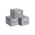 Studio shot of three grey fabric storage boxes with lids and label holders stacked together