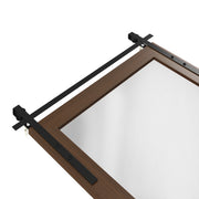 Angled corner close-up of the frame and sliding-door style rail fittings