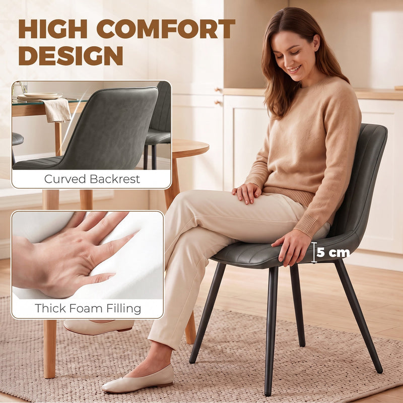 Close-up of the grey chair's curved backrest and thick foam seat padding