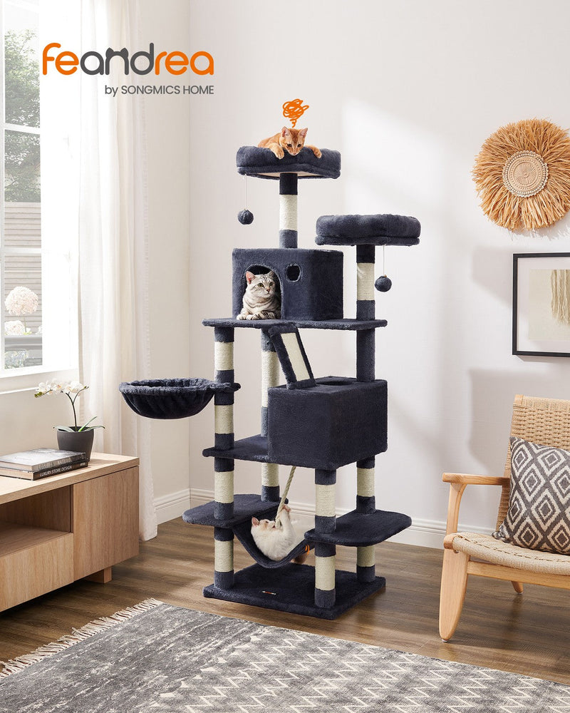 Feandrea cat tree styled in a living room with a cat resting in the cave