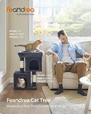Feandrea cat tree styled in a living room with a man relaxing on the sofa