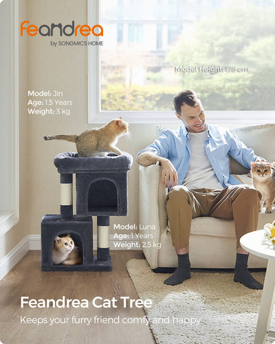Feandrea cat tree styled in a living room with a man relaxing on the sofa