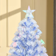 Close-up of the star topper on top of the white and blue tree