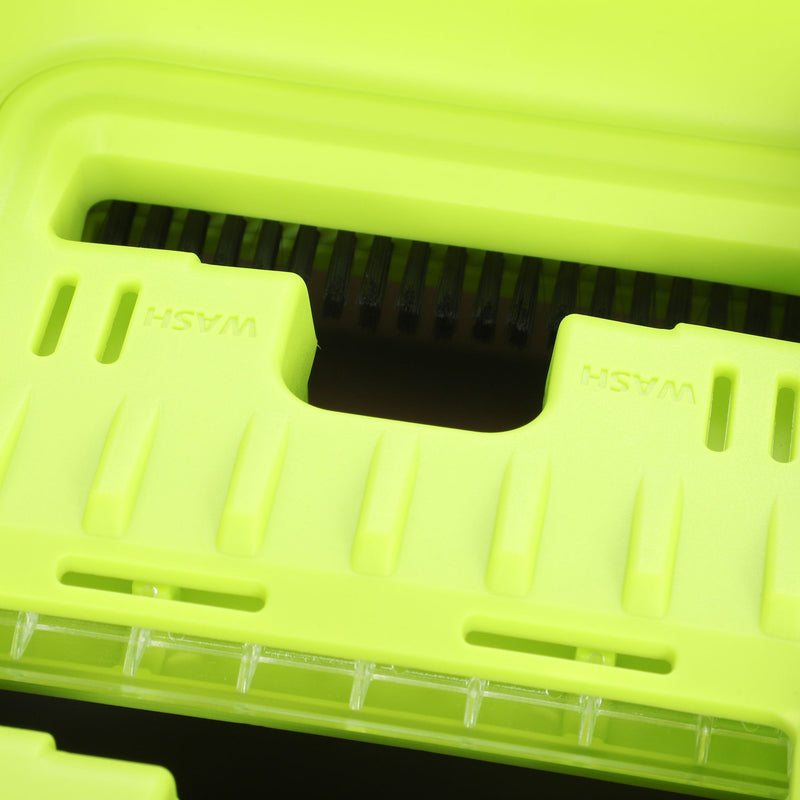 Close-up of the green wash chamber lid and wringer on the bucket