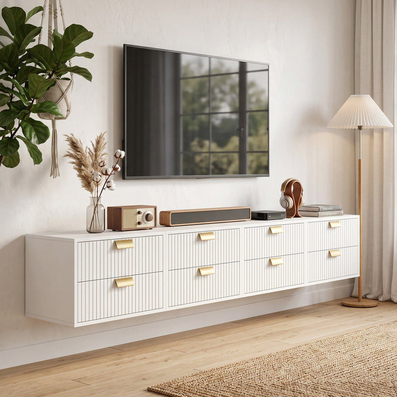 Four white fluted units joined along a wall as a floating media unit under a TV
