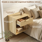 Open drawer showing personal items stored on the oak nightstand