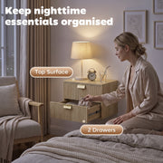 Woman opening the lower drawer of an oak nightstand with the top surface and 2 drawers labelled