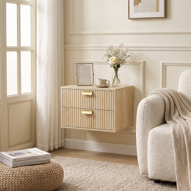 Single oak nightstand mounted beside a cream armchair near a window