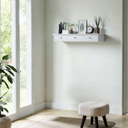 Songmics white floating shelf with drawers open showing storage space