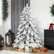 6ft flocked Christmas tree with presents beside a dark chest of drawers and grey curtains