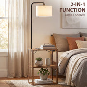 Rustic brown 2-in-1 floor lamp and shelves beside a bed with books and houseplants