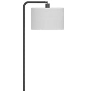Close-up of the curved black arm and light grey fabric lampshade on the rustic brown lamp