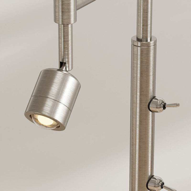 Close-up of the adjustable reading light head and switches on the silver pole