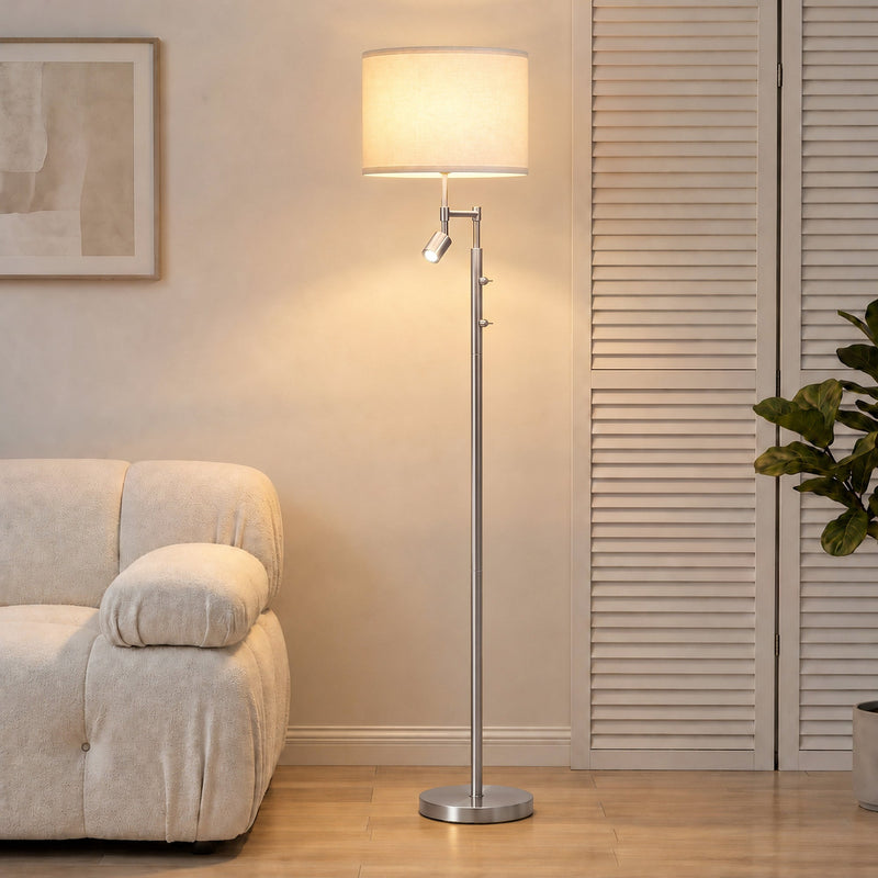 Silver floor lamp with reading light beside a cream sofa and shuttered doors