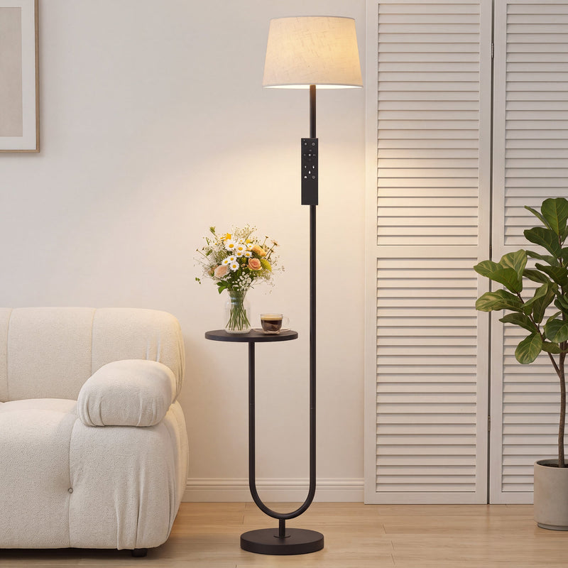 Black floor lamp with shelf beside a cream armchair and shuttered doors