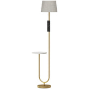 Gold floor lamp with linen shade and round white shelf on a white background