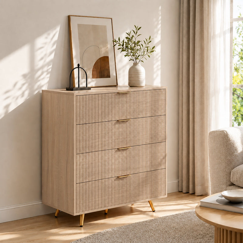 Natural wood chest of drawers styled in a bedroom beside curtains and a coffee table