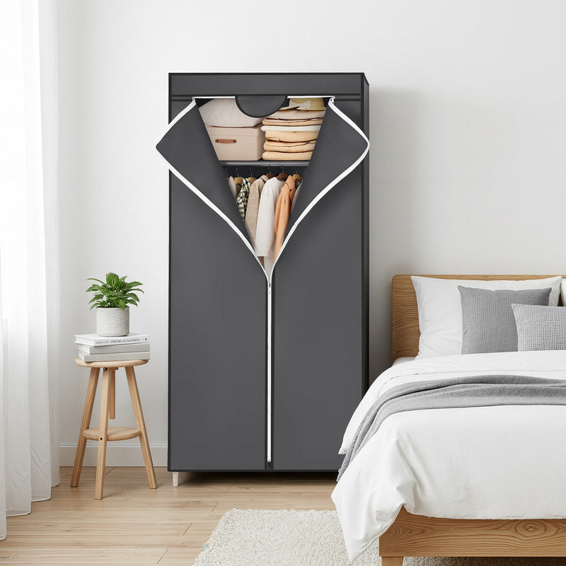 Close-up of the two storage shelves inside the canvas wardrobe
