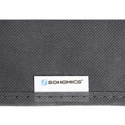 Close-up of the Songmics label stitched onto the grey non-woven fabric