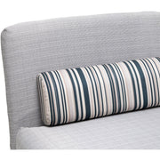 Grey chair bed backrest with striped bolster pillow, close-up angle