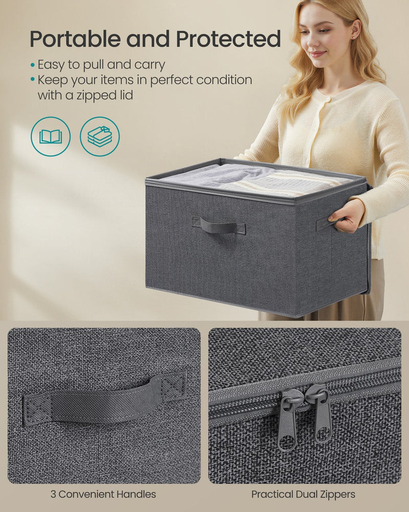 Close-up of the box's carry handle and dual zip lid pulls, with a person carrying a box