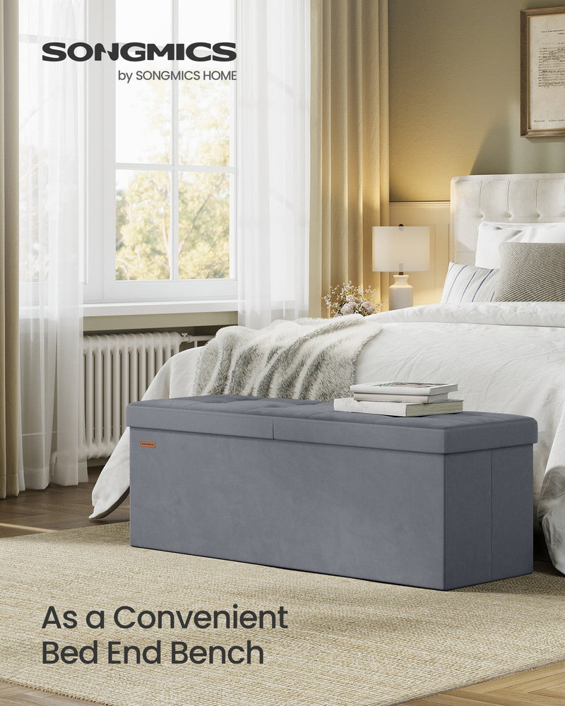 Songmics storage ottoman with lid open showing interior storage space, 110 cm slate grey