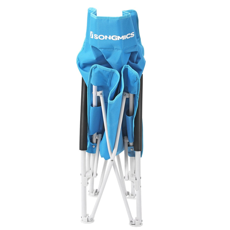 The beach chair folded closed and standing upright, seen from the front