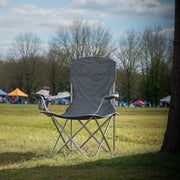 Folding camping chair close-up of built-in cup holder in armrest