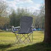 Folding camping chair folded down with carry bag