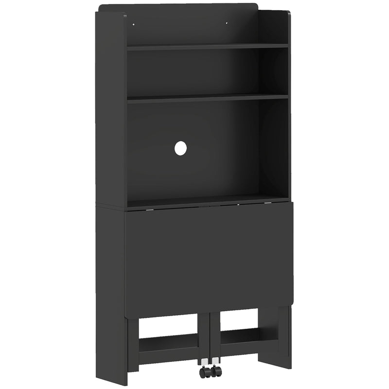 Black folding desk on a white background in its folded position, showing the open shelves, the cable hole in the back panel and two rear wheels