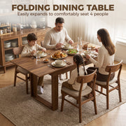 Family of four eating dinner at the expanded walnut effect folding dining table