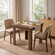 Walnut effect folding table folded down for a compact two-person breakfast setting