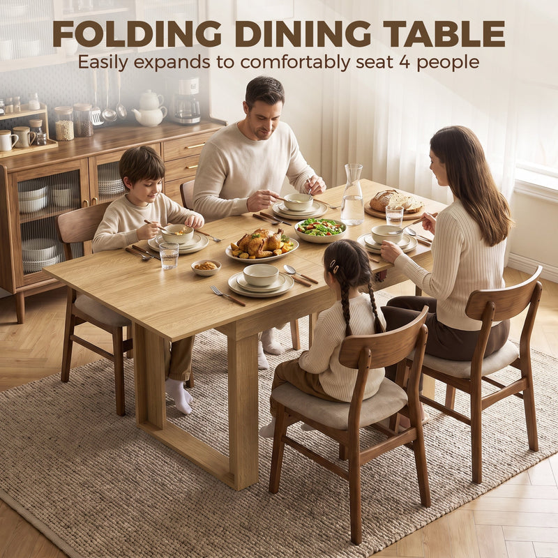 Family of four eating dinner at the expanded oak effect folding dining table