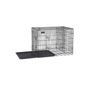 Empty black metal dog crate with the plastic tray slid out of the base