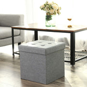 Light grey cube tucked under a coffee table in a bright living room