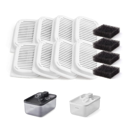 Eight white carbon filters and four black sponges above two Feandrea cat fountains