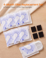 Sealed filter packs and four black sponges on a wooden surface in a 4-month replacement set