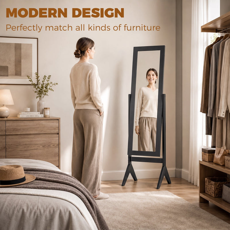 Freestanding mirror styled beside an open wardrobe