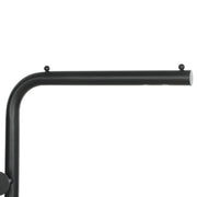 Close-up of the black top rail and hooks at the bend of the clothes rail