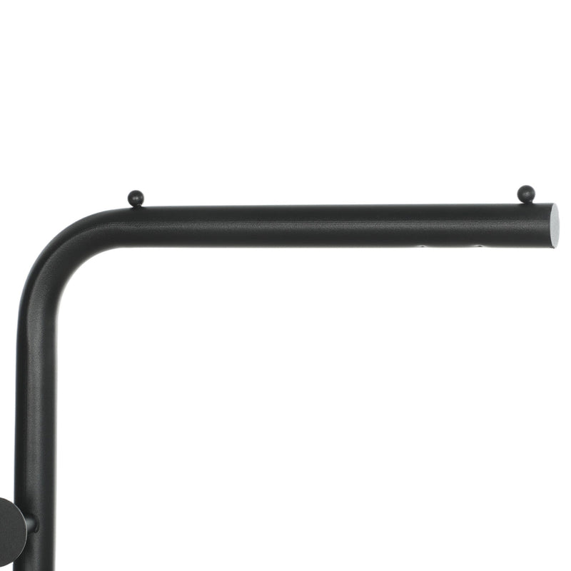 Close-up of the black top rail and hooks at the bend of the clothes rail