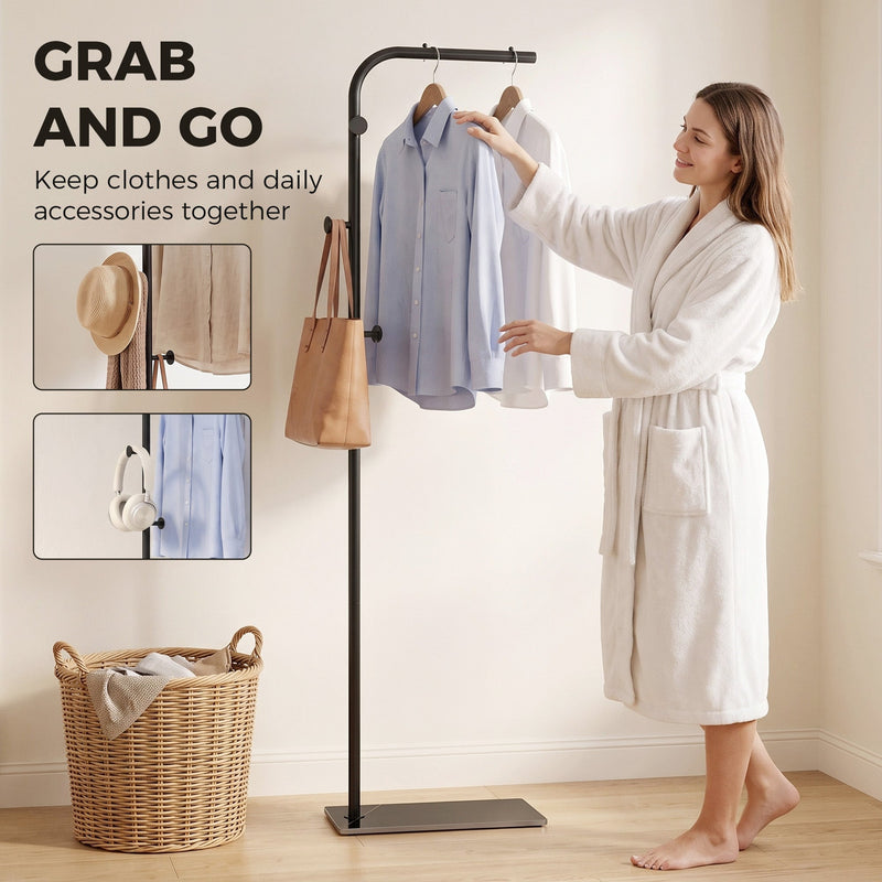 Woman taking a shirt from the black clothes rail, with close-ups of the hooks holding a hat and bag