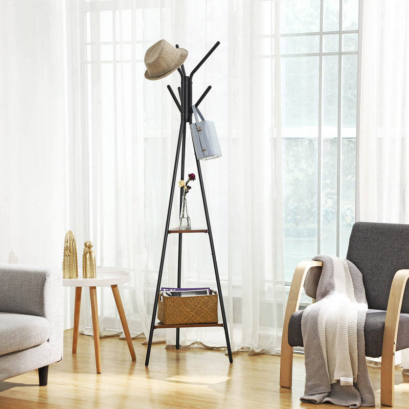 Coat rack stand in a bright living room beside a sofa, armchair and side table