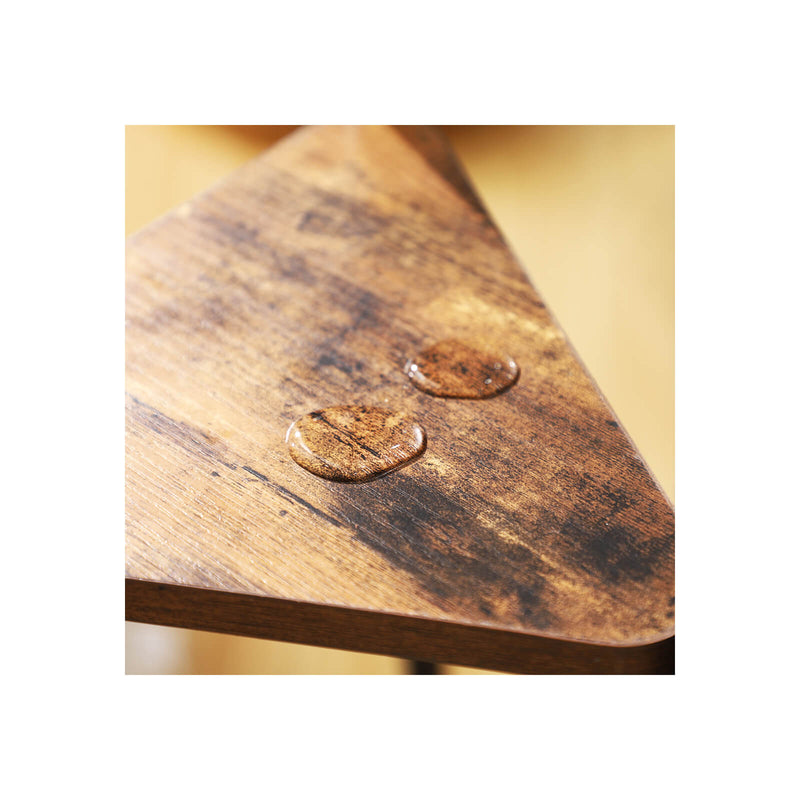 Close-up of the rustic brown shelf corner with water droplets beading on the surface