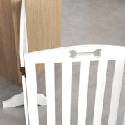 Close-up of a folding hinge and support foot on the dog gate panel